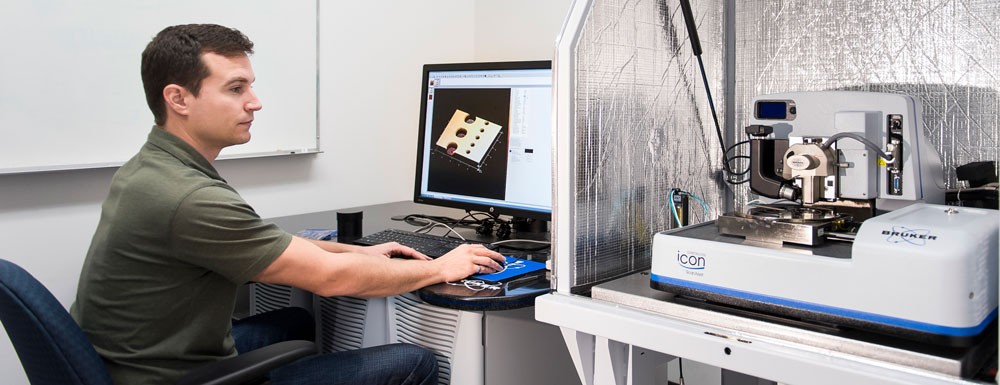 Person using structural analysis equipment at 4D LABS