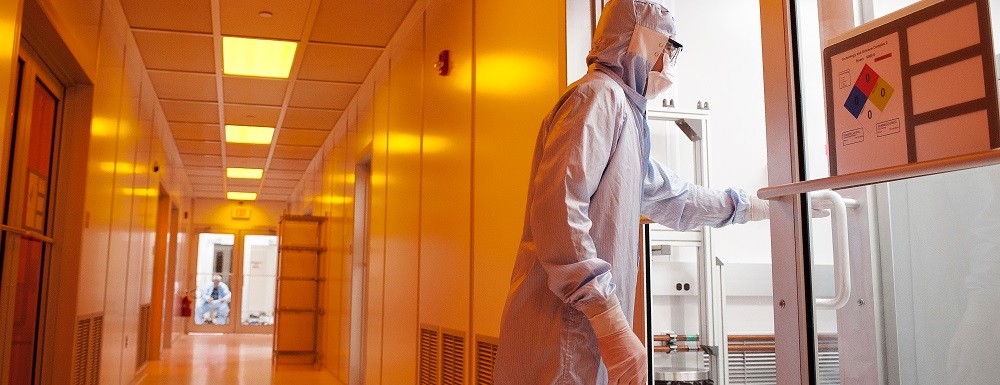 Person entering class 100 clean room at 4D LABS